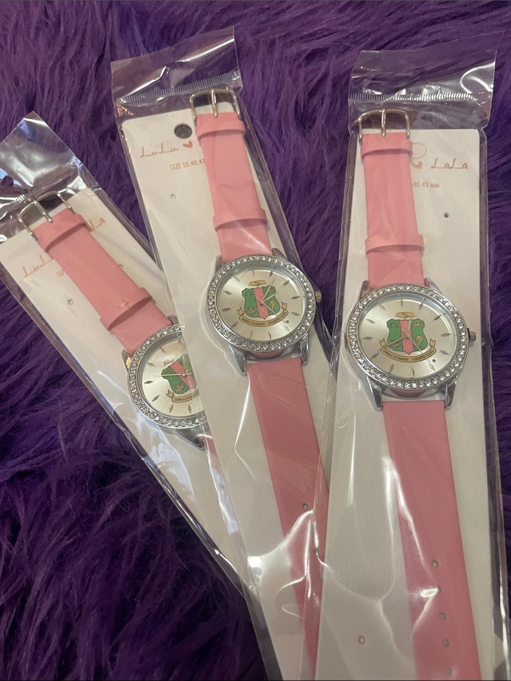 Pink Women's Watch with Decorative Crest